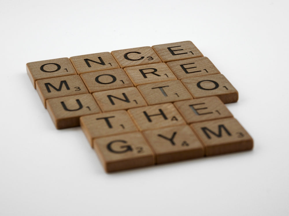 a couple of scrabbles that are on a table