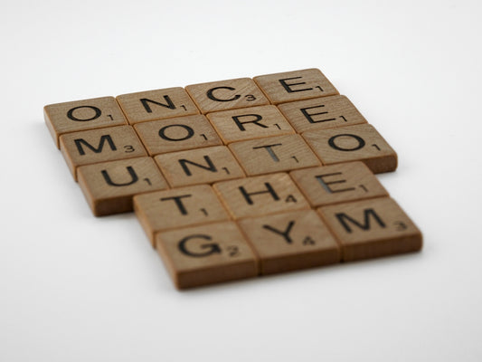 a couple of scrabbles that are on a table